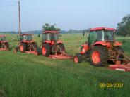 Tractors, demonstrating the work of the Public Works Department